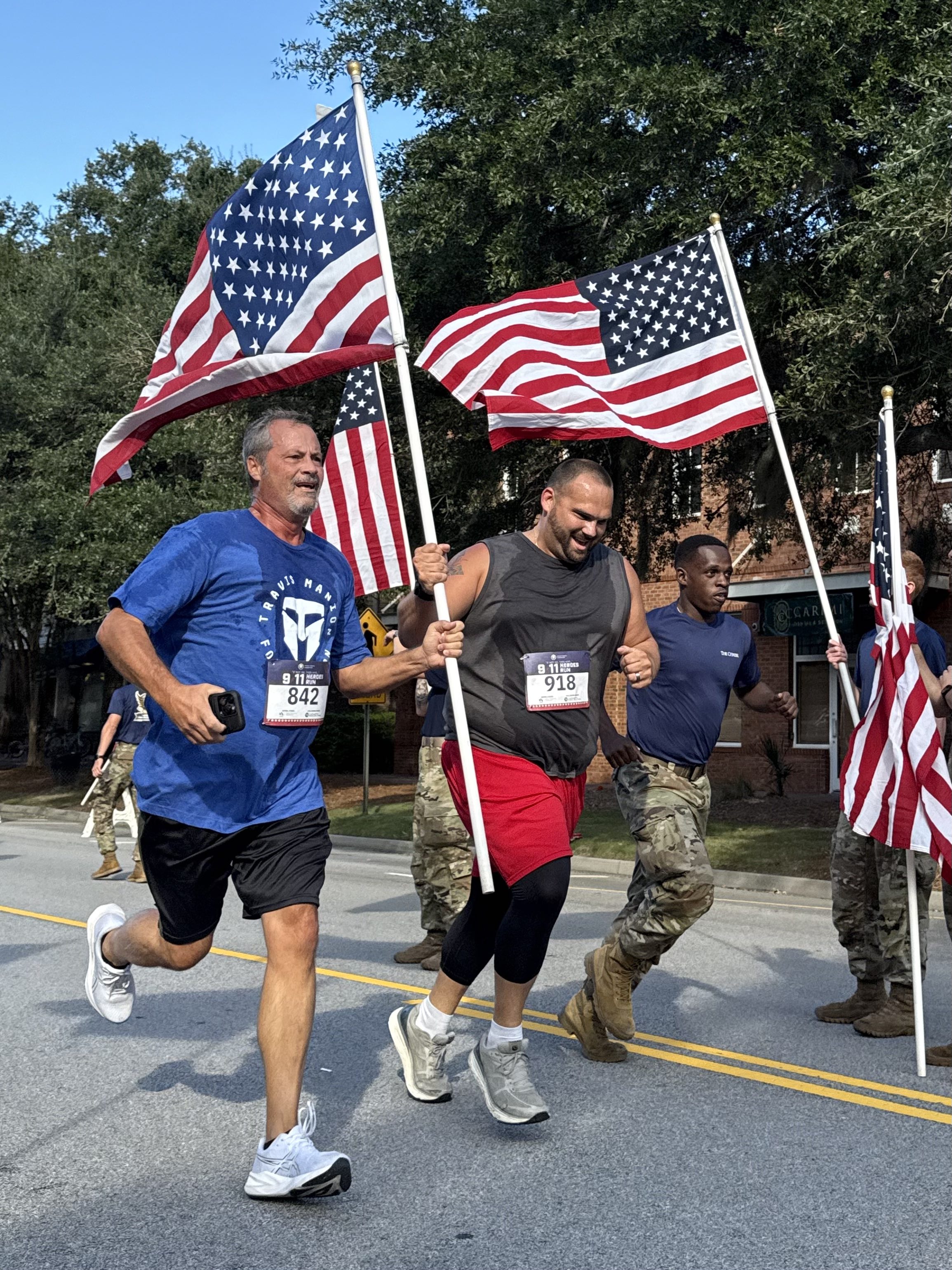 Scott Canady DI honors 9/11 hereos, carries their names across the finish line | The ...